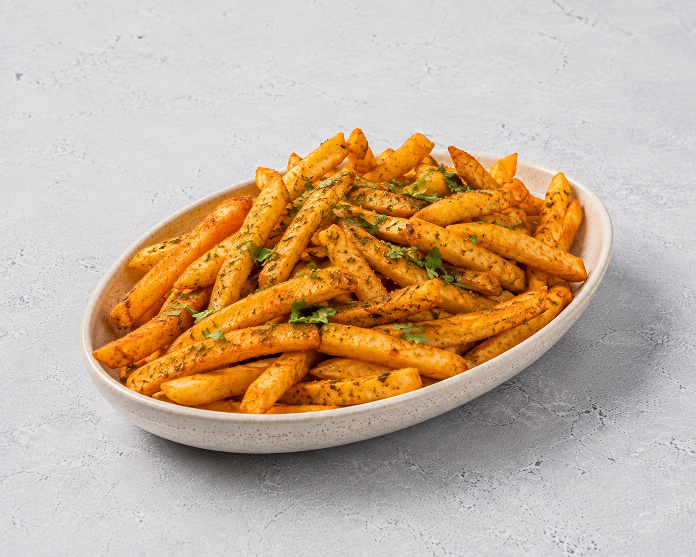 Masala Fries coated with tandoori masala and herbs