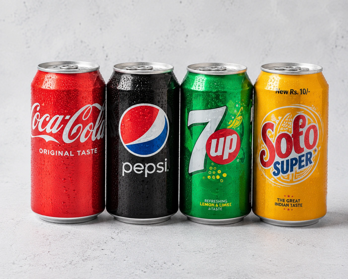 Selection of soft drink cans including Coca-Cola, Pepsi, 7up and Solo Super